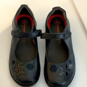 New blue school shoe with flower